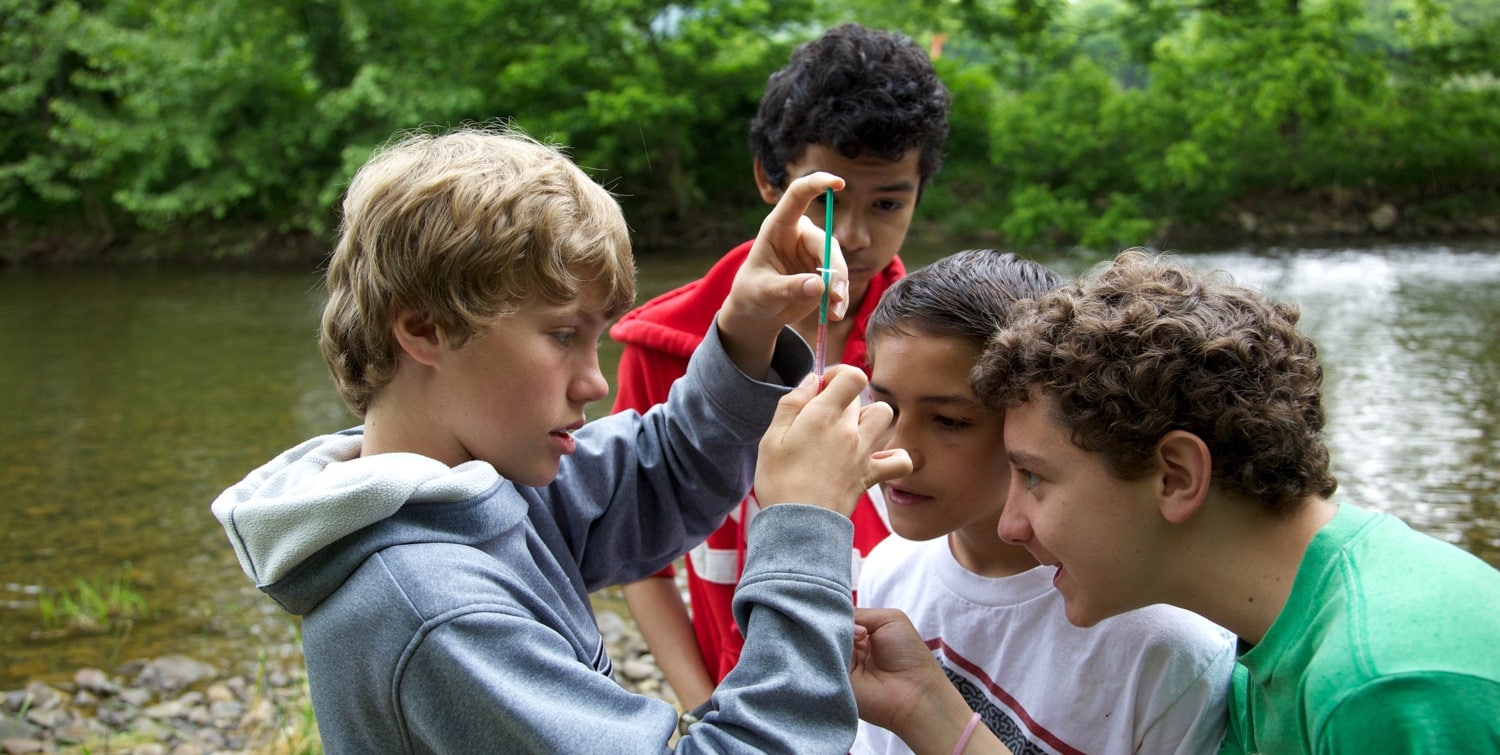 children testing water quality children testing water quality